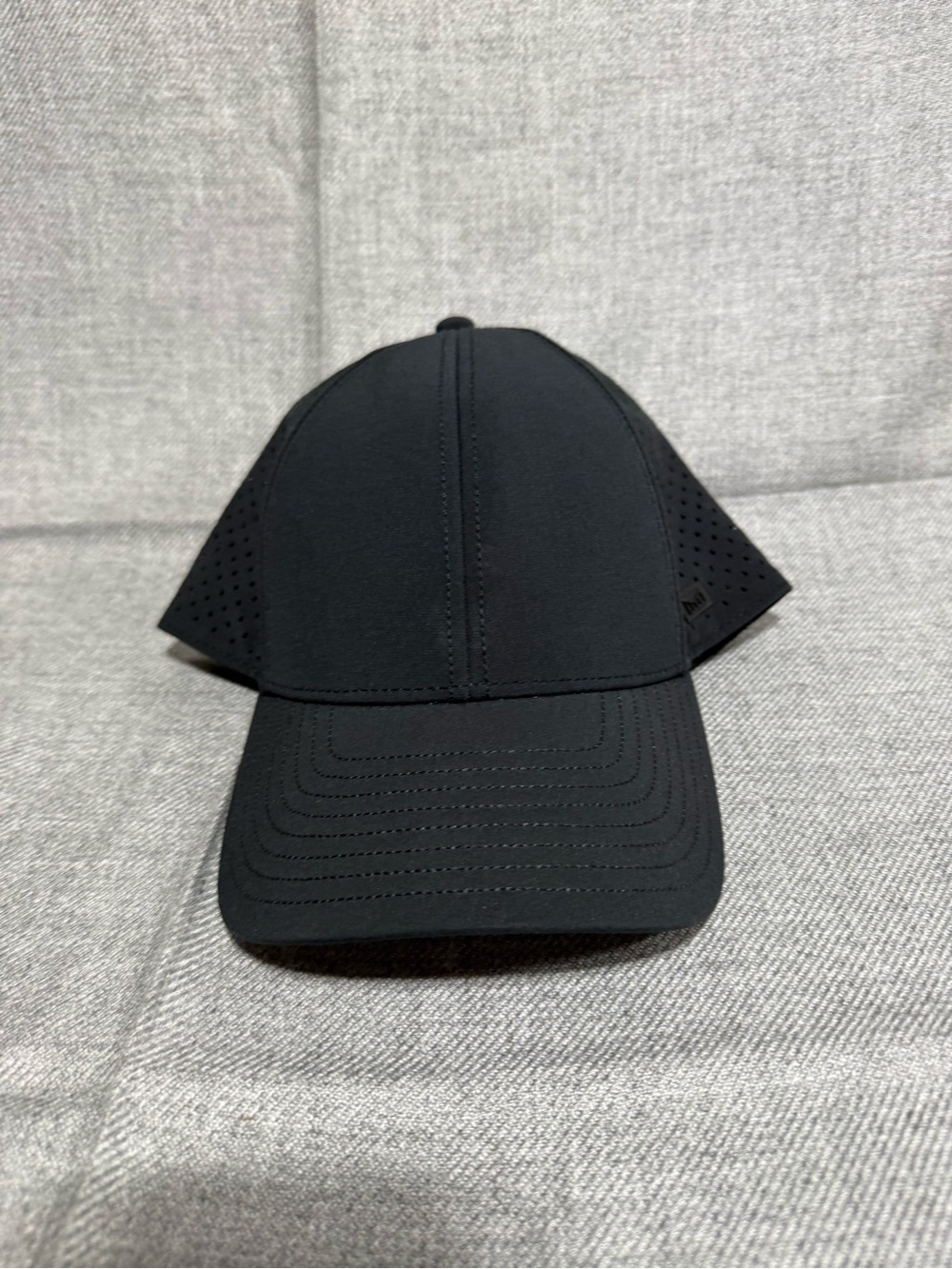 Melin A-Game Hydro Black Hat Snapback Water Resistant Performance Cap OS